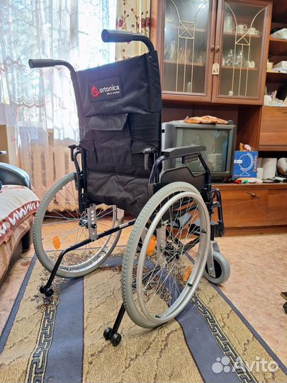 Инвалидная коляска новая