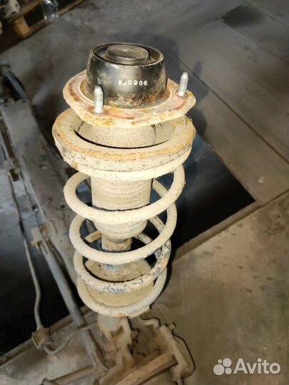 Амортизатор с пружиной задний левый Chevrolet