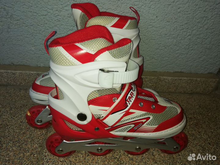 Роликовые коньки