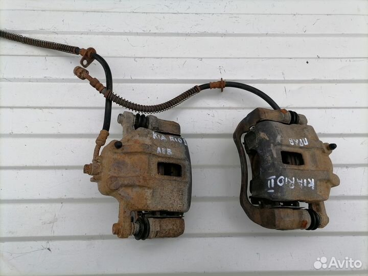 Суппорт передний левый, правый Kia Rio 2