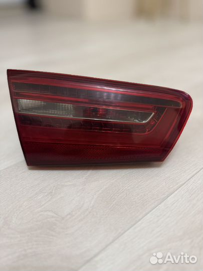 Фонарь задний в багажник ауди а6с7 левый