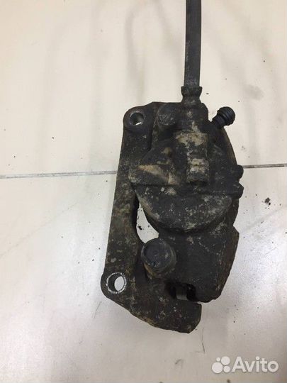 Суппорт тормозной передний левый Renault Megane