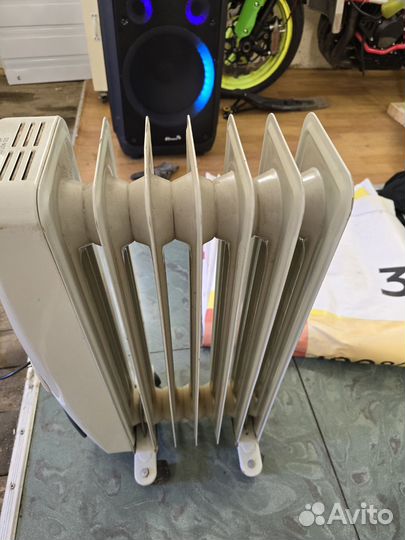 Масляный обогреватель