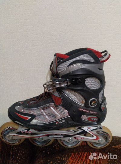 Роликовые коньки