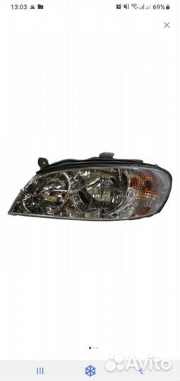 Фара Kia spectra