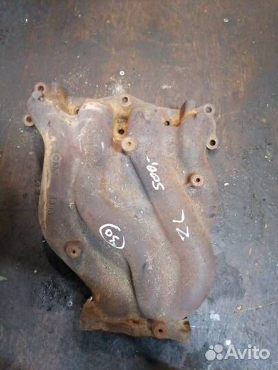 Коллектор выпускной Mazda Familia ZL