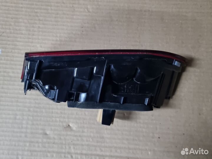 Фонарь левый в крышку багажника Volkswagen Polo