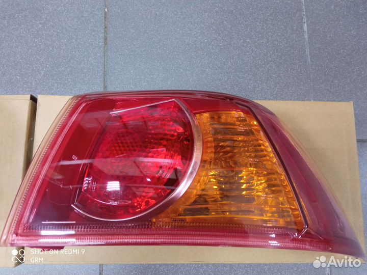 Фонарь задний. наружный Mitsubishi Lancer X