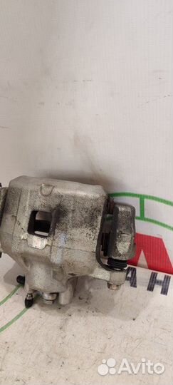 Суппорт передний левый Mitsubishi Lancer 10 CY3A