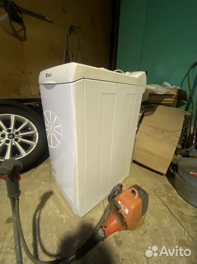 Стиральная машина с вертикальной загрузкой