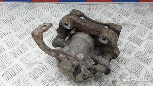 Суппорт тормозной задний правый toyota corolla E15