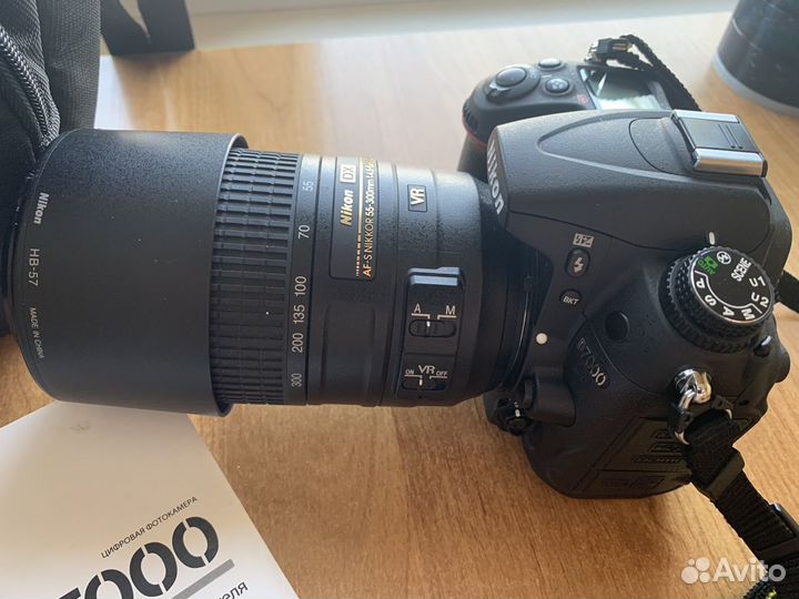 Зеркальная фотокамера Nikon D7000 с обьективом