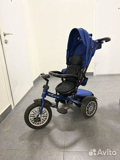 Трехколесный велосипед с ручкой