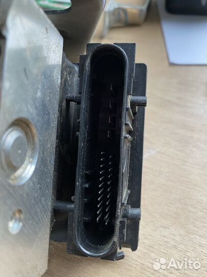 Блок ABS Nissan tiida