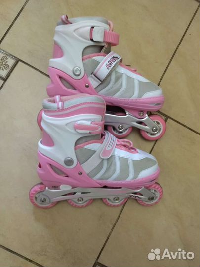 Роликовые коньки