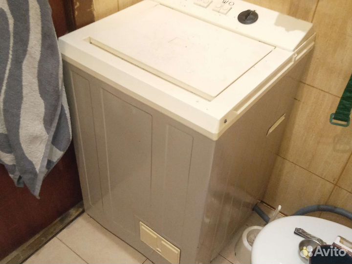 Стиральная машина с вертикальной загрузкой