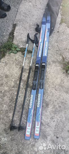 Лыжи фирма fischer с ботинками размер 32-34