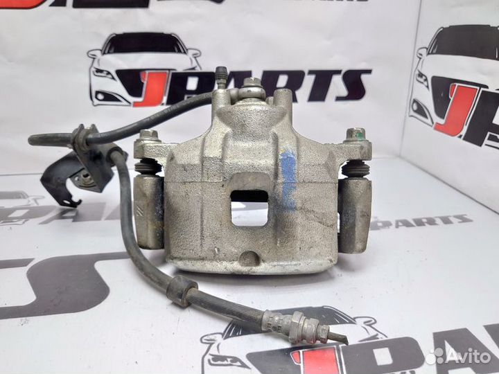 Суппорт тормозной передний Mitsubishi Lancer