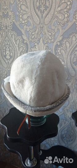 Женские меховые шапки