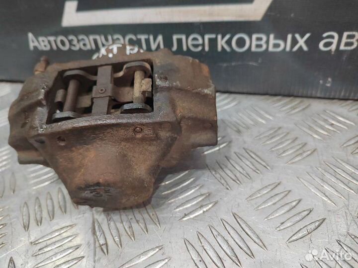 Суппорт тормозной задний левый Opel Vectra B