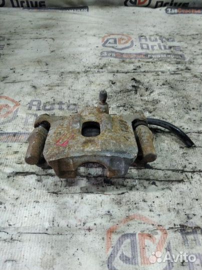 Суппорт тормозной задний правый Mitsubishi Lancer