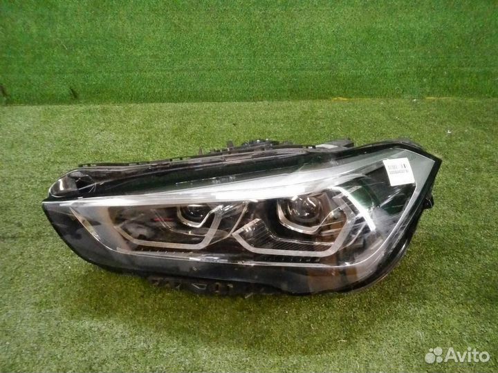 Фара левая BMW X1