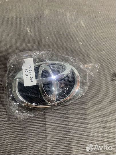 Эмблема Решетки Радиатора Toyota Corolla 10-13