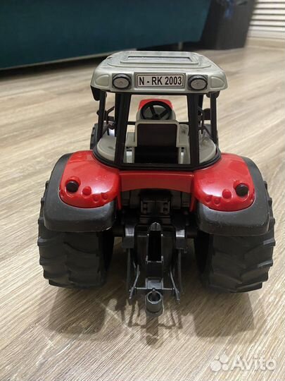 Игрушка трактор