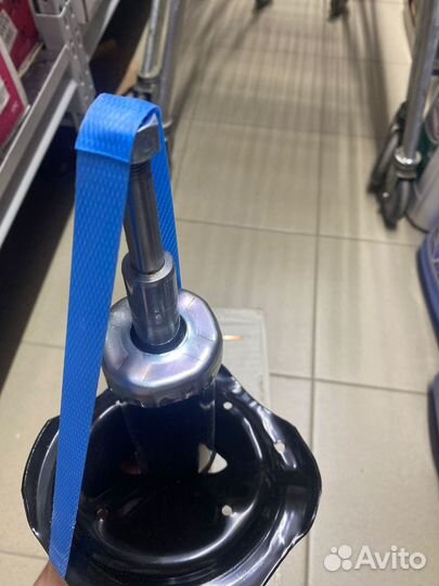 Амортизатор задний левый Mazda 323 BJ