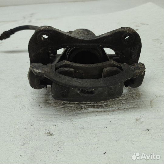 Суппорт тормозной передний левый Hyundai Lantra J1