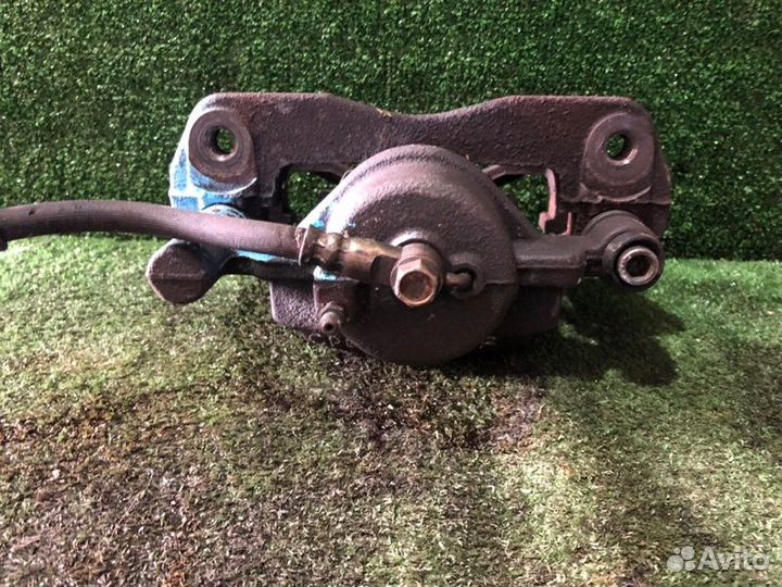 Суппорт тормозной передний правый Mazda Premacy