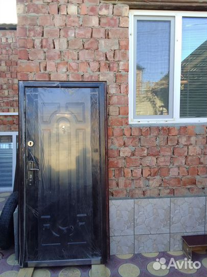 Металическая входная китайская дверь б/у