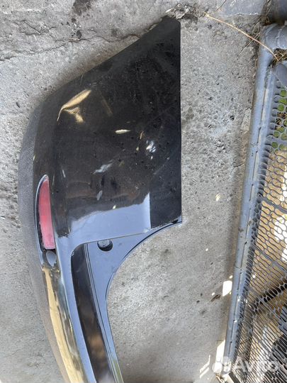 Бампер задний Mazda Demio DY D5Y15003X