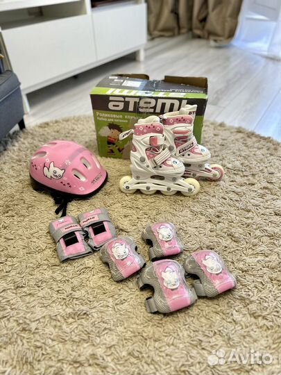 Роликовые коньки и защита