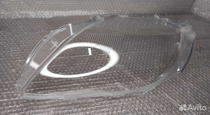 Стекло фары Toyota Corolla E150