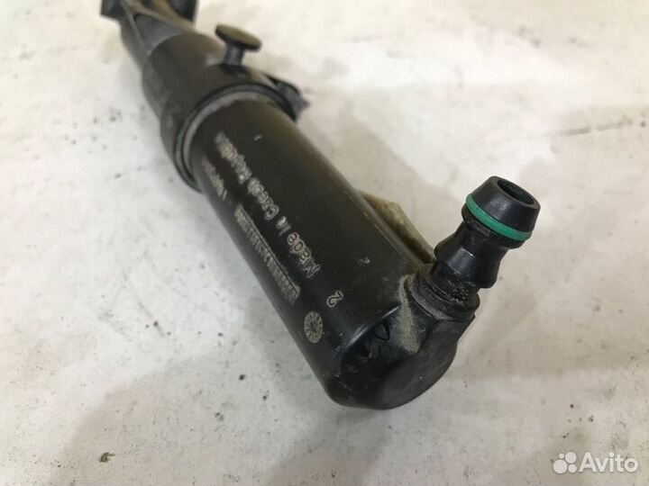 Форсунка омывателя фар передняя левая