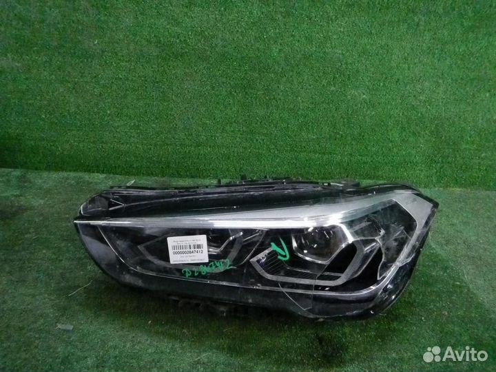 Фара левая BMW X1
