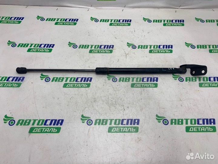 Амортизатор крышки багажника задний левый Suzuki