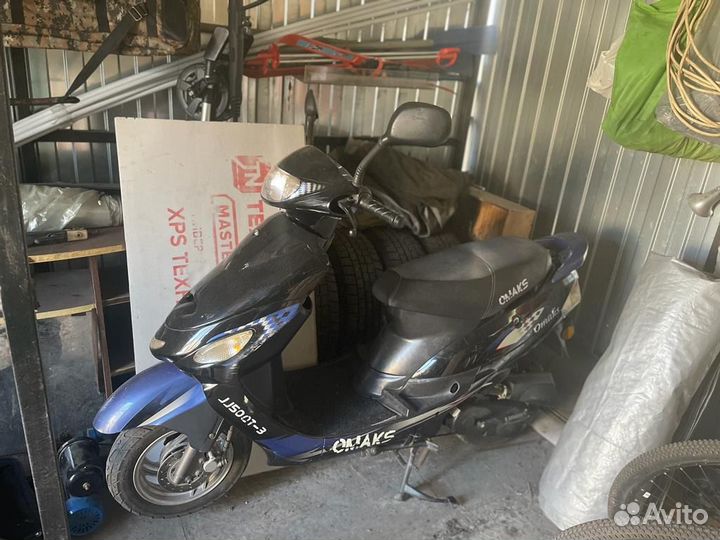 Скутер омакс