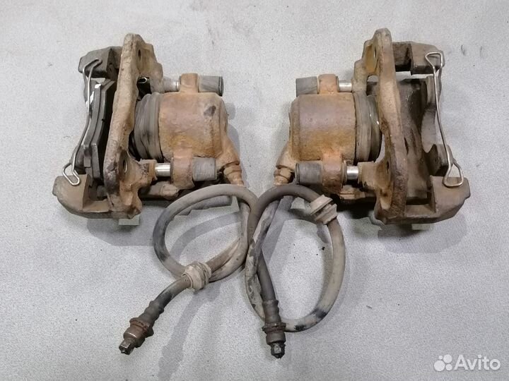 Суппорт тормозной передний для Kia Sephia/Shuma 1