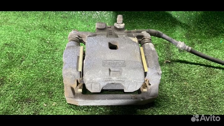 Суппорт тормозной задний правый Mazda CX-9 1