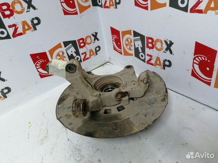 Кулак поворотный левый Chery Tiggo T11 1.6