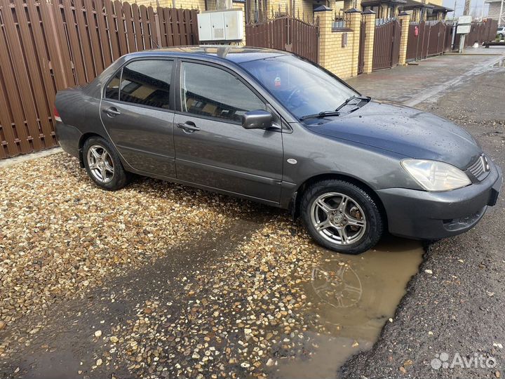 Mitsubishi Lancer 1.6 МТ, 2006, 238 000 км