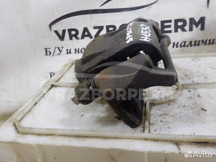 Суппорт тормозной передний левый Kia Spectra