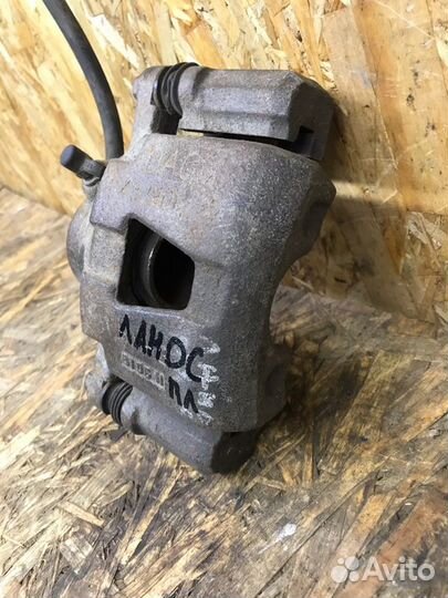 Суппорт тормозной передний левый Chevrolet Lanos