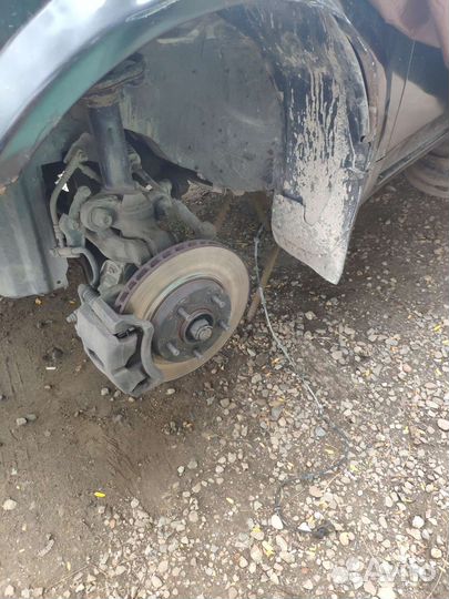 Nissan primera p12 суппорт передний со шлангом