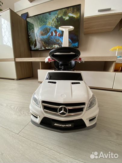 Машинка каталка толокар