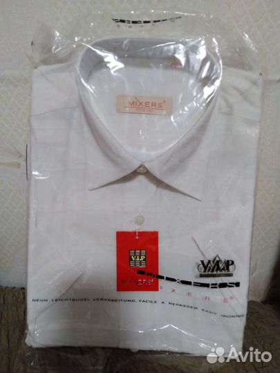Рубашки мужские новые