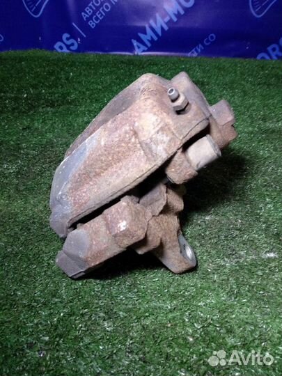 Суппорт тормозной передний левый Volkswagen Tiguan