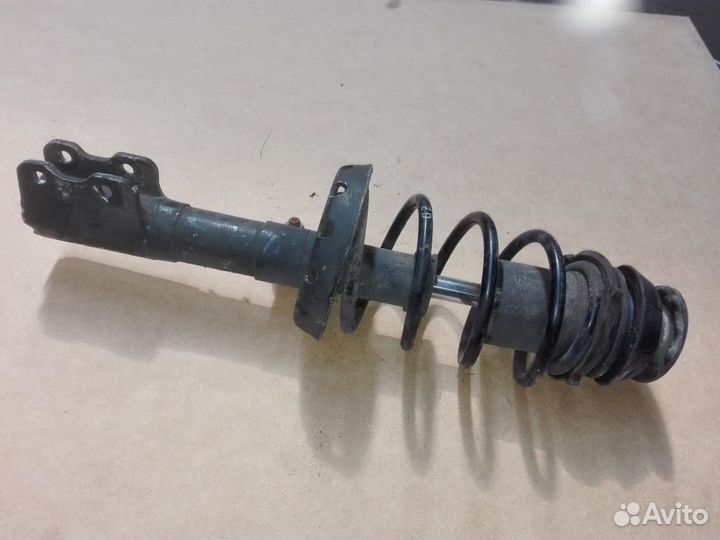 Стойка амортизатора переднего правого Opel Astra G